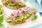 Toasts with canned tuna and avocado guacamole