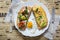 Toasts with egg, aragula, tomato and cheese,French toast bread with veggies