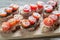 Toasts with tahini and mint sauce and cherry tomatoes