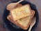 Toasts topped with Condensed milk on table