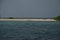 Tobago Cays Caribbean beach strip Birds and Sail Boat