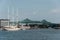 Tobin bridge in Boston MA, USA and the Athena 295 foot yacht docked at the Boston harbor