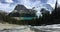 Toboggan Falls flowing down to Berg Lake, overlooking Mount Robs