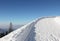 Toboggan run in wintry german alps, blue sky