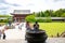 Todaiji Temple, Nara, Japan.Couple praying in front of Todaiji Temple with the gigantic Daibutsu - Great Buddha