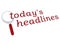 Today`s headlines with magnifiying glass