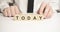Today word made of wood background. Business concept. Today sign, current day concept. Calendar concept. Word today written with