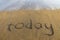 today writing in sand