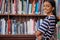 Todays studying plants the seeds for tomorrows exam success. a female standing in a library.