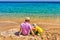 Toddler boy on beach with father