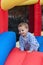 Toddler Boy in Bounce House