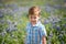 Toddler Boy in Field of Blue Bonnets