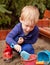 Toddler boy playing in sand