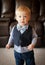 Toddler boy wearing bow tie and suit vest