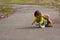 Toddler carrying stuffed animal and exploring