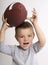 Toddler Catching Football