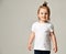 Toddler child baby girl kid standing in white free text space t-shirt