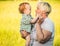 Toddler child with grandmother outdoors