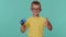 Toddler children boy show plastic bank card advertising transferring money cashless, online shopping