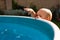 Toddler explore swimming pool