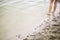 Toddler feet in water at the beach