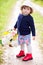 Toddler girl with basket of flowers