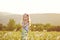 Toddler girl in daisy field