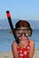 Toddler girl with father`s diving glasses and snorkel