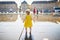 Toddler girl having fun famous outdoor water fountain Miroir d`eau in Bordeaux