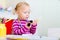 Toddler girl playing with finger toys