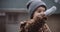 Toddler girl playing outside in a Toronto park.