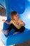 Toddler girl on slide with static electricity