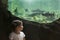 Toddler girl visiting a river aquarium