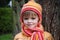 Toddler girl with woolly cap and scarf