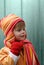 Toddler girl with woolly cap and scarf