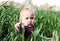 Toddler in the green grass