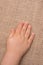 Toddler hand with canvas background