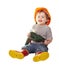 Toddler in hardhat with drill. Isolated over white