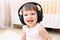 Toddler listening to music