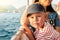 Toddler with mother enjoys boat trip past coast of Marmaris