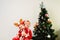 Toddler and newborn baby, siblings disguised as christmas, holiday concept