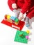 Toddler playing building toys