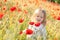 Toddler in poppy field