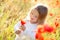 Toddler in poppy field