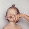 Toddler posing with hipster mustache