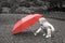 Toddler with red umbrella