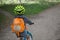 Toddler riding a balance bike along the path in the park