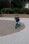 Toddler riding on his balance bicycle