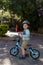 Toddler sitting on his balance bicycle