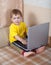 Toddler using laptop